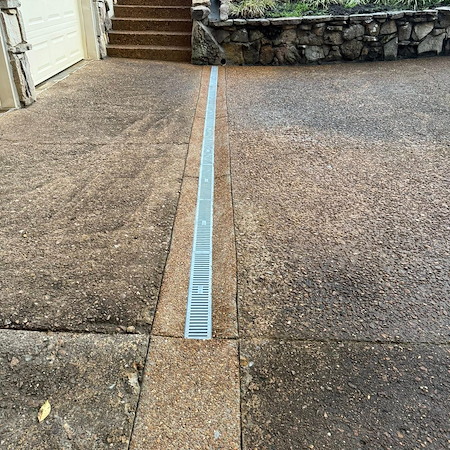 5 Signs Your Yard Needs a French Drain Before Summer Storms Hit